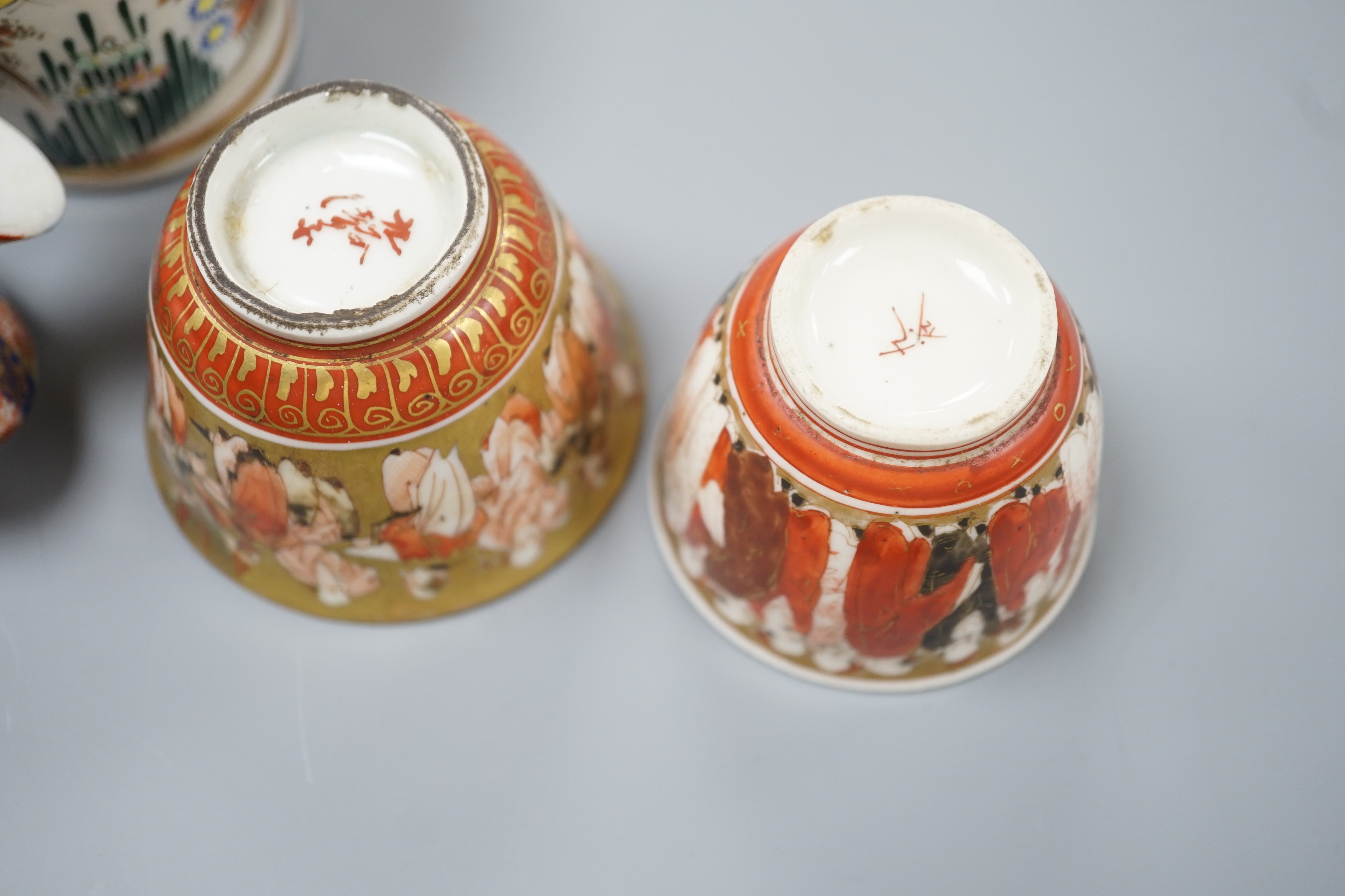 A group of Japanese small or miniature Kutani and Imari vessels and three Satsuma pottery mounted brooches, largest 11.7cm